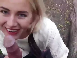 Mind-blowing light-haired having orgy in the public park uncovering her vagina crevice